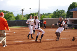 Tanner Horton, Mollee Cohee, Taylor Treadway and Belle Bright celebrate the Lady Bucs 3-2 sectional win over Meigs County Friday. (Photo courtesy Mike Higginbotham)