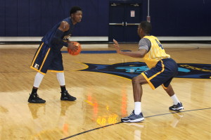 Guards Petey McClain (with ball) and Rashawn Rembert -- shown here at Monday's practice -- form part of a strong, veteran backcourt. (Photo by Jeff Keeling)