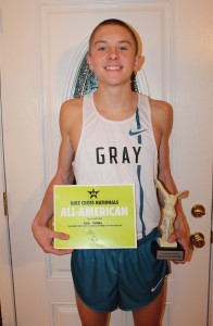 Barnard, less muddy in his Nike-issued uniform with fifth-place trophy and first-team All-American certificate. Photo by Jeff Keeling