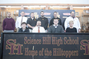 Bailey Feathers to Carson Newman – Science Hill senior Bailey Feathers signed a letter of intent to accept a scholarship to play football at Carson Newman. Shown above are: Back row (L-R), Matt Eads, Bart Lyon, Andrew Beck, Grady Moore, Stacy Carter and Ralph Nelson. Front row (L-R), Brandon Feathers, Chris Feathers, Bailey Feathers and Lisa Feathers.