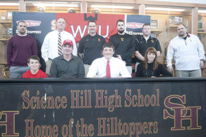 Alex Rinella to Western Kentucky – Science Hill senior Alex Rinella signed a letter of intent to accept a scholarship to play football at Western Kentucky University. Shown above are: Back row (L-R), Matt Eads, Bart Lyon, Stacy Carter, Grady Moore, Andrew Beck and Ralph Nelson. Front row (L-R), John Rinella, Brad Rinella, Alex Rinella and Joan Rinella.
