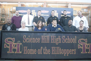 Malcolm White to Tennessee-Chattanooga – Science Hill senior Malcolm White signed a letter of intent to accept a scholarship to play football at the University of Tennessee at Chattanooga. Shown above are: Back row (L-R), Matt Eads, Bart Lyon, Andrew Beck, Stacy Carter, Grady Moore and Ralph Nelson. Front row (L-R), Billy Patton, Virginia Christian, Susan Patton, Malcolm White, Jeff White and Christy White.