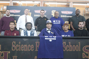 Mikey White to Western Carolina – Science Hill senior Mikey White signed a letter of intent to accept a scholarship to play football at Western Carolina University. Shown above are: Back row (L-R), Matt Eads, Bart Lyon, Stacy Carter, George Turners and Jeff White. Front row (L-R), Rashad Harrington, Isiah Stephens, Mikey White, Tonya Brown and Tate Isbell. Photos by Chris Robertson and Jeff Derby