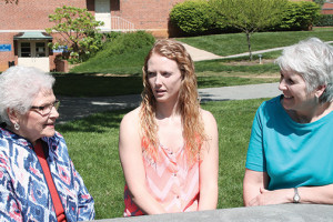 Sarah Elliott, Meredith Hardy and Donna Hardy sit and talk at their alma mater. Photo by Sarah Colson