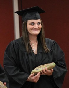 Nikita holds a smooth rock she received during the ceremony. Each graduate received two rocks that night--one rough rock to represent the rough past they were leaving behind, and one smooth rock to celebrate the smooth future they’ve chosen. Photos by Sarah Colson