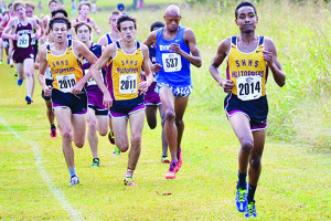 Malick Gemeche, right, helps lead fellow Science Hill runners Alex Crigger, center, and Noah Charles on the way to Science Hill’s team win at Saturday’s Eye Opener meet in Spartanburg, S.C. Photo by Cora Wymer