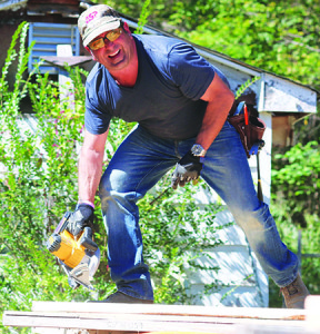 Gene Gorab, here working on the Hiser house, has been instrumental in the New Build program’s growth. Photos by Sarah Colson