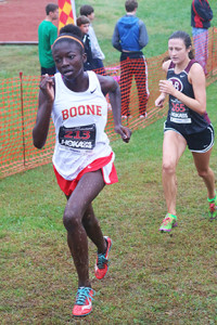 Daniel Boone sophomore Maria Chellah strides toward the finish ahead of Dobyns-Bennett’s Erica Stone. Photos by Jeff Keeling