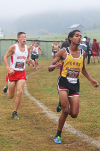 Science Hill senior Malick Gemechu, right, and Daniel Boone freshman Chance Bowman, here near the one-mile mark, stayed close, finishing 2.4 seconds apart in ninth and tenth, respectively.