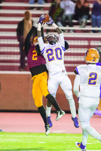 Science Hill’s Jordan Holly and a Smyrna player fight for a high ball. Photo by Bart Nave Photography