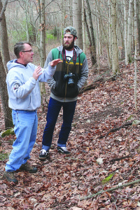 Bill Francisco, left, describes Jacob’s Park to Daniel Norris as they climb a trail in the park’s forested section. Photos by Jeff Keeling