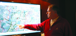 Johnson City City Manager Pete Peterson studies an on-screen map of the areas in Gray where some citizens want to be deannexed from the city.