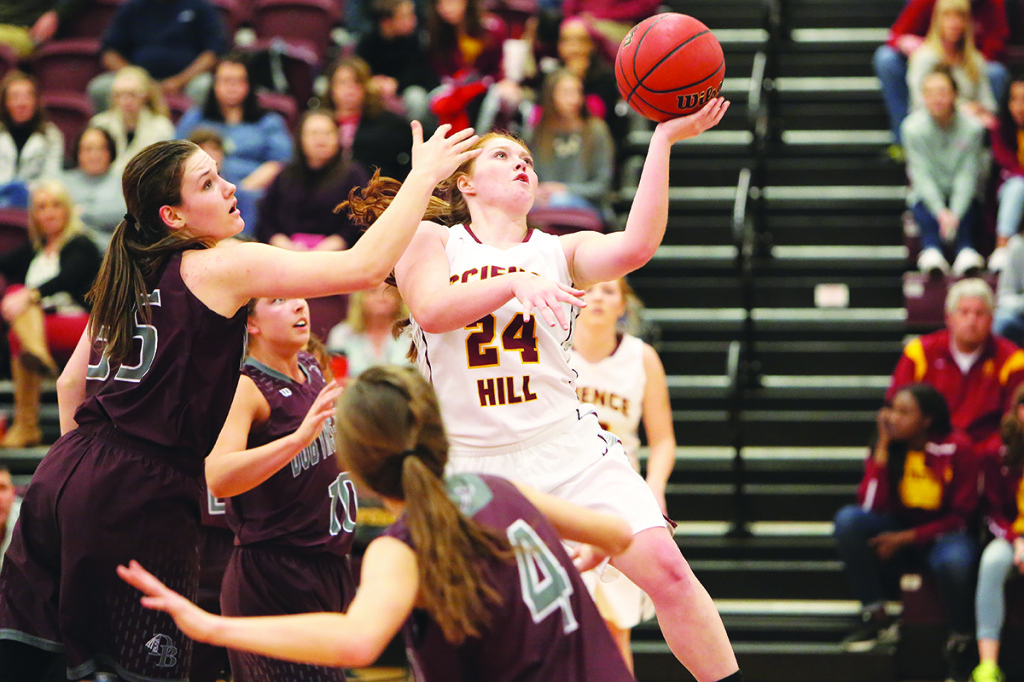 Courtney McCurry releases a shot in traffic.