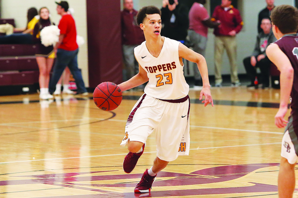 Topper Bowden Lyon brings the ball upcourt.