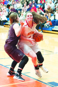 Sophomore guard Macie Culbertson muscles into the lane in the Lady Trailblazers’ finals loss to Dobyns-Bennett. Photos by Bart Nave. Photo galleries at: bart.ifp3.com