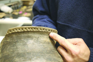 The rim of this piece from Cane Notch shows the distinctive style for which the site is named. The punctated notches are thought to have been produced using thin cane stalks cut and sharpened into styluses.