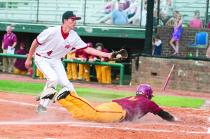 Bryson Tolley, shown here reaching home after a wild pitch, leads the team with a .443 batting average.
