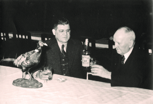 Power brokers: Judge Cox, right, meets with a “constituent” – either Ken or Bill Matthews. Photo courtesy Archives of Appalachia.