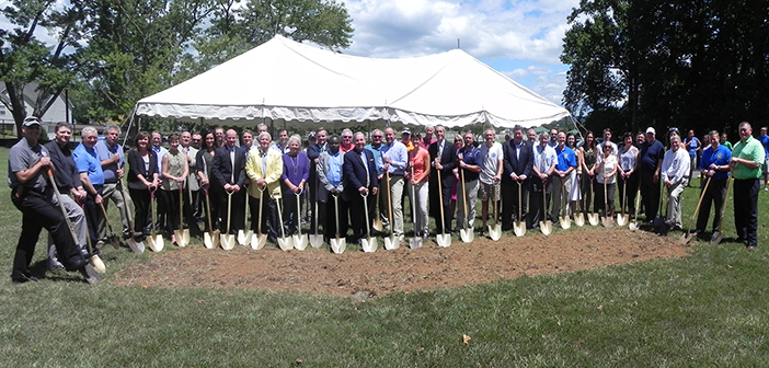 Rotary Club of Johnson City members along with city and county officials prepare to break ground for the new Boundless Playground and Splash Pad at Rotary Park for children with special needs. The project has been six years in planning and fundraising. Photo by Bill Derby
