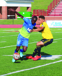 Team leader and former East Tennesee State University player Itode Fubara, “Fubi,” battles to maintain possession. Photo by Jeff Keeling