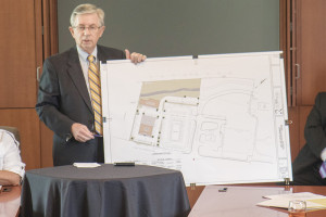 Local architect Ken Ross shows off his plans for the proposed Cootie Brown’s restaurant during the April 21 PBA meeting. Photo by Collin Brooks