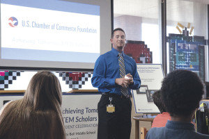 Liberty Bell teacher Jordan Blackburn congratulates the students on completing the online course. Photos by Collin Brooks