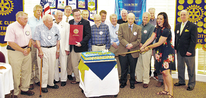 Rotary of Johnson City members who joined the club from 1960’s through 1980’s celebrated the club’s official centennial by cutting their 100th birthday cake during the club meeting May 30th. On hand for the cake cutting were, from the left: Cecil Green, Ernest Campbell, Dr. Horace Cupp, Skip Oldham, Greg Slemp, State Represenative Matthew Hill who presented the club’s state proclamation, Dr. Lee Malone, Bob Owens, Norman Fleenor, Preston Eldred, Dr. John Bradshaw, Dick Ray, Howard Dunbar, cake-cutter Sarah Schumaier and Ben Siler. Photo courtesy of Ben Siler