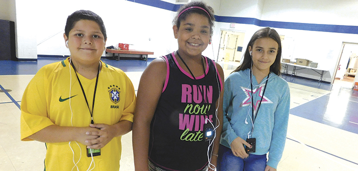 Using STEM technology, funded by a TVA grant, to learn and have fun at Coalition for Kids this summer. Left to right: Cipriano Garcia, Shyanne Adams and Brevynn Miller.