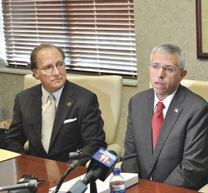 Mountain States Health Alliance CEO Alan Levine (right) speaks at a press conference as Wellmont Health Systems Board Chairman Roger Leonard looks on. Photo by Dave Ongie