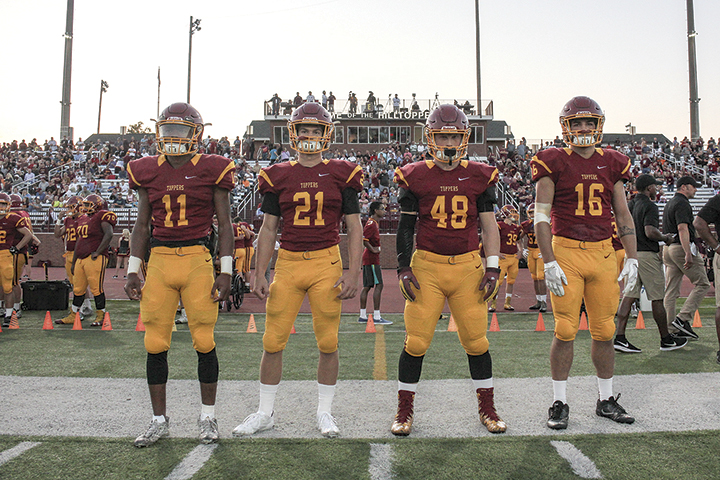 Science Hill captains (left to right) Jaylan Adams, Tristan McPeak, Josh Kota and Denzel Medina prepare for the coin toss. Photos by Robert Kell, creativestoryvisuals.com