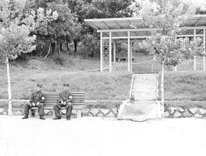 In 1967 two North Korean guards sit where the present day North Korean building in the photo on the left now stands. Photo By Bill Derby