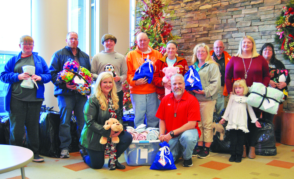Family and friends of Joshua Adcock make their annual donation of stuffed animals and blankets to the Niswonger Children’s Hospital. Photo by Dave Ongie