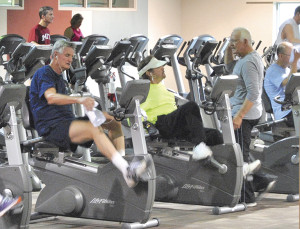 Members of the Lifestyle Center in Johnson City enjoy some camaraderie during a morning workout. PHOTOS BY DAVE ONGIE