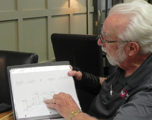 Mickey Jilton, who is heading the steering committee raising funds for the memorial, shows off an early rendering of the project. PHOTO BY DAVE ONGIE