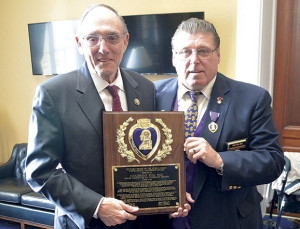 Military Order of the Purple Heart National Commander Neil Van Ess (right) presents Rep. Phil Roe with an award. CONTRIBUTED