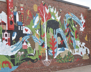 A large mural on the perimeter of the park provides a splash of color for those who visit King Commons. PHOTO BY DAVE ONGIE