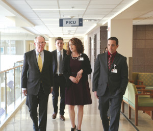Lisa Carter (center), CEO of Niswonger Children's Hospital, takes Sen. Lamar Alexander (left) on a tour of the facility. CONTRIBUTED
