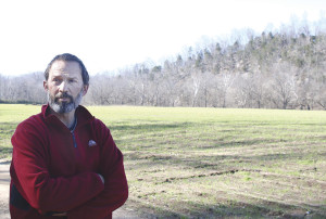 A photo of Dr. Jay Franklin looks out over the dig site, which is located in Washington County. PHOTO BY JEFF KEELING