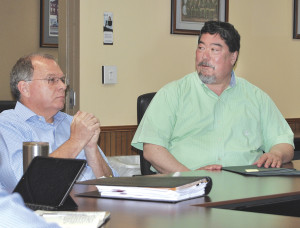 City Manager Pete Peterson (left) and Mayor David Tomita take part in a discussion following the presentation made by the Sesquicentennial Commission.