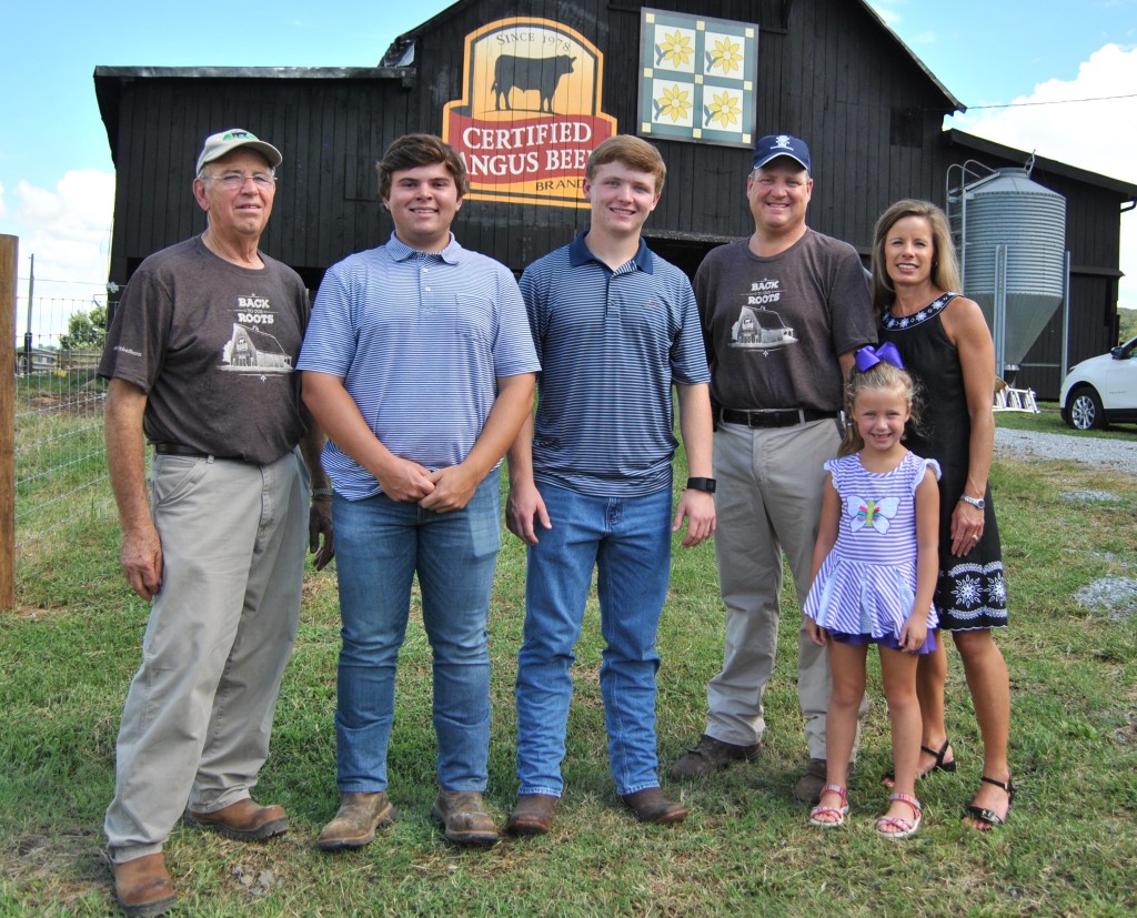 From left, Sam Widener, Will Edwards, Ben Edwards, Chris Widener, Kelsey Widener and Cindy Widener pose in front of the new Certified Angus Beef logo that was painted onto their barn as part of a national marketing campaign. The Widener family has owned Wincrest Angus since 1984. PHOTO BY DAVE ONGIE
