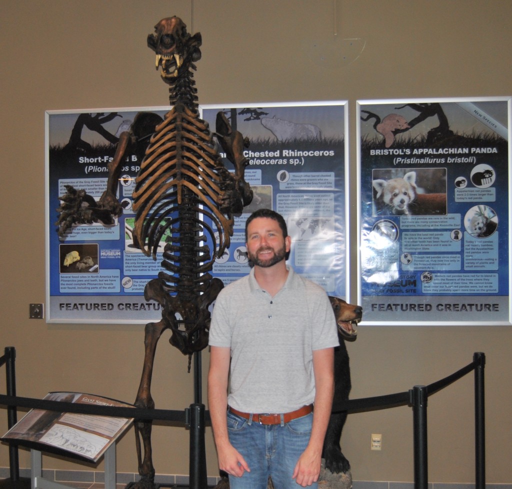 Andy Marquart, executive director of the Hands-On! Discovery Center, next to a new display in the lobby inside the Gray Fossil Site and Natural History Museum. Hands-On! Welcomed over 25,000 visitors from 41 states during their first two months in their new location. PHOTO BY DAVE ONGIE