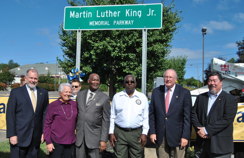 From left, Johnson City manager Pete Peterson, Johnson City vice-mayor Jenny Brock, Rev. Lester Lattany, NAACP chapter president Ralph Davis, State Senator Rusty Crowe and Johnson City Mayor David Tomita were on hand for to watch the unveiling of the sign that designated a portion of North State of Franklin Road as the Martin Luther King Jr. Memorial Parkway. PHOTOS BY DAVE ONGIE