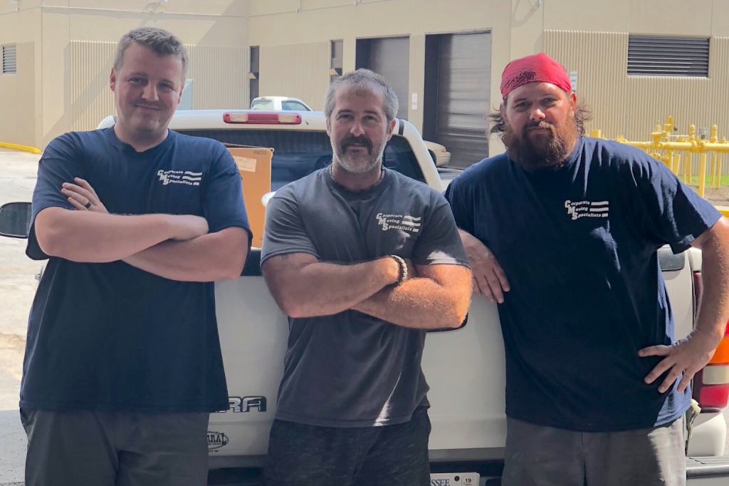 Sean Dodson, Allen Nelson and Jeremy Hall of Corporate Moving Specialists helped transport approximately 4,000 pounds of donated clothing from the Johnson City Medical Center. CONTRIBUTED