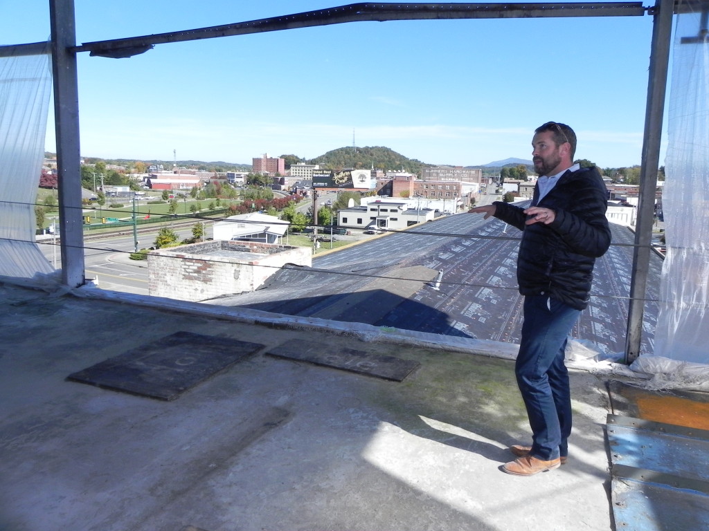 Owner Grant Summers explains renovation details during a November 2018 tour of the former Model Mill building. Photo by Bill Derby, publisher.